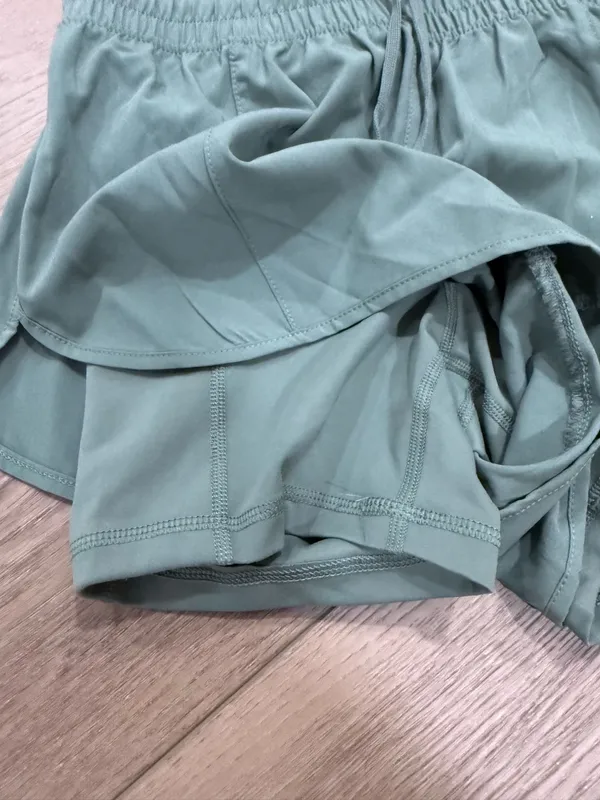 Amazon Sage green running shorts with spandex underneath - Image 3