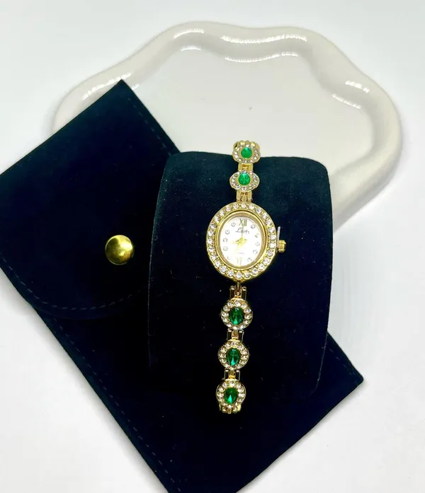 Luxury women’s watch sparkly emerald green stone - Image 4