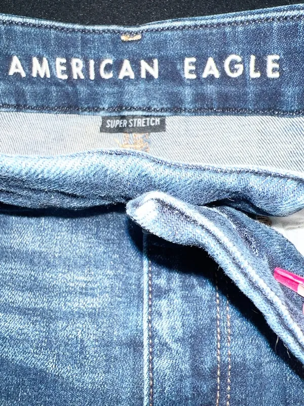 American Eagle Dark Wash Blue Raw Hem Frayed Denim Hi-Rise Shortie Jean Shorts - Image 11