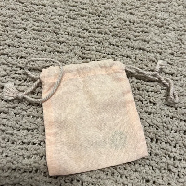 Gorjana Blush Pink Drawstring Jewelry Pouch with Gold Logo - Image 2