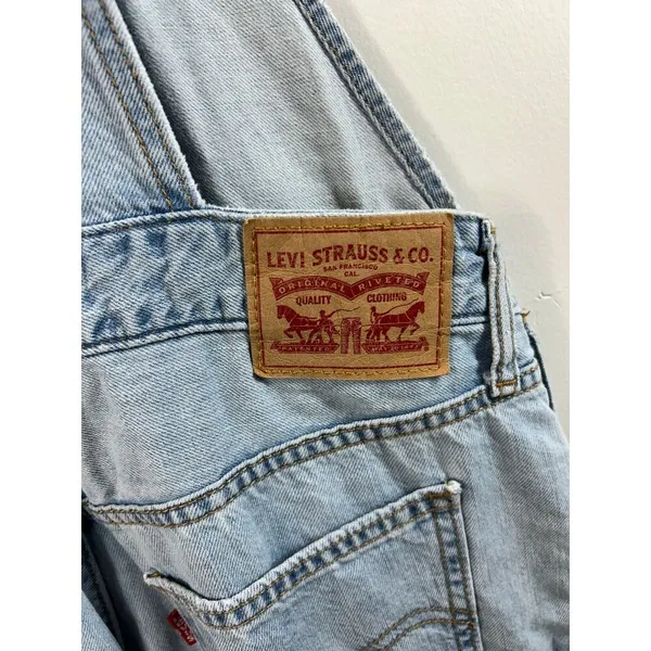 Levi’s classic slim fit light wash overalls. women’s size small. - Image 3