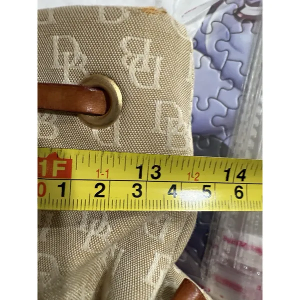 Dooney and Bourke Beige Canvas and Leather Signature Tassel Tote Handbag‎ - Image 8
