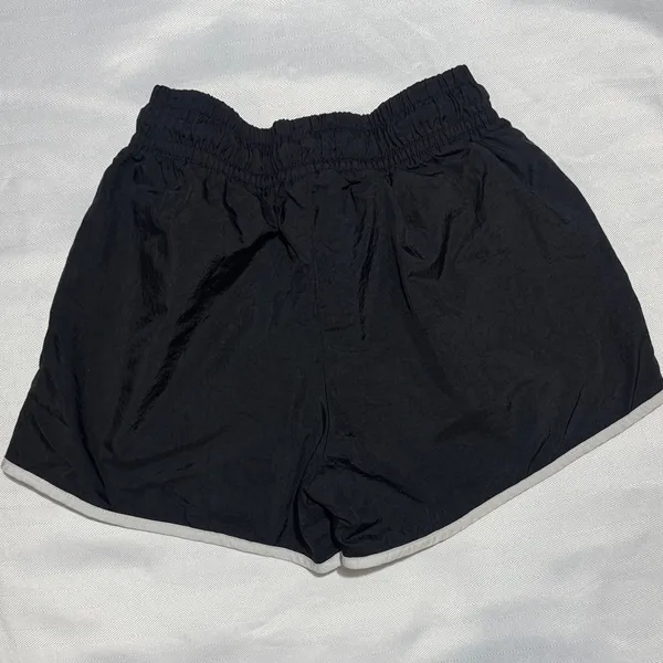 Nike Women's Black Athletic Shorts with White Piping - Image 4