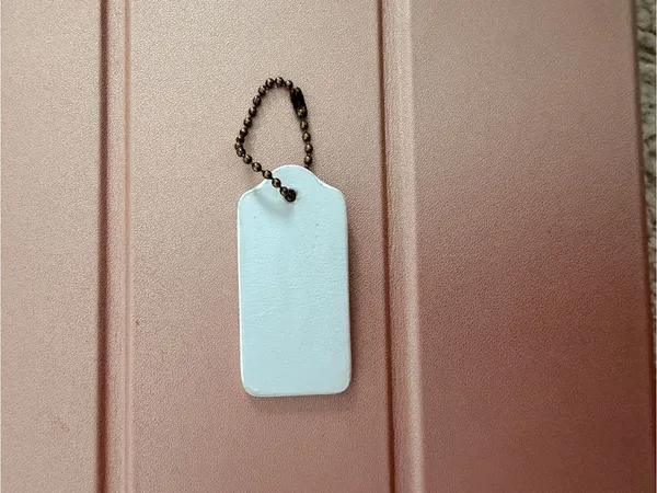 Coach New York White Foam Hang Tag Bag Charm Replacement - Image 3