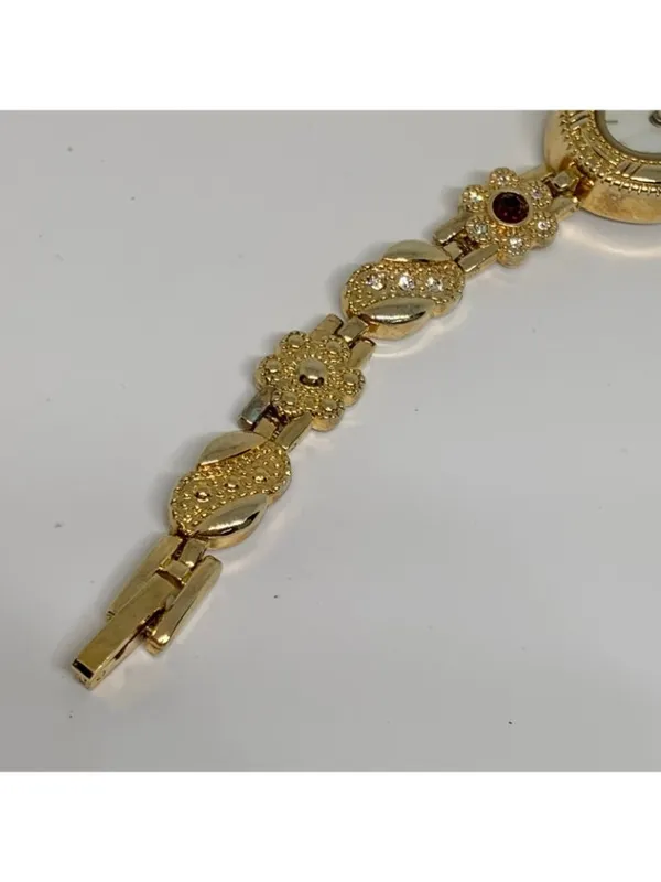 Allude gold tone women’s watch red stones 19mm floral links up to 7.5” running - Image 5