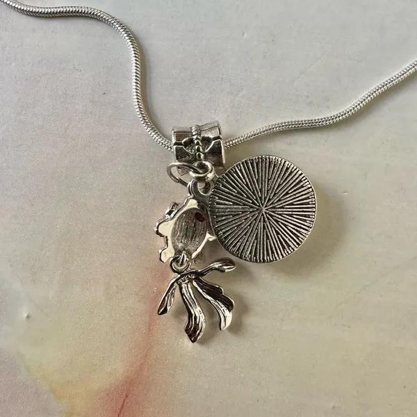 Silver tone fish pink disc charm necklace Silver - Image 4