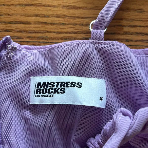 Mistress rocks purple dress - Image 2