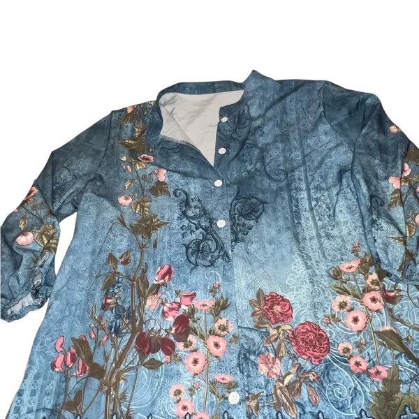 Blue faded look top with floral design. - Image 6