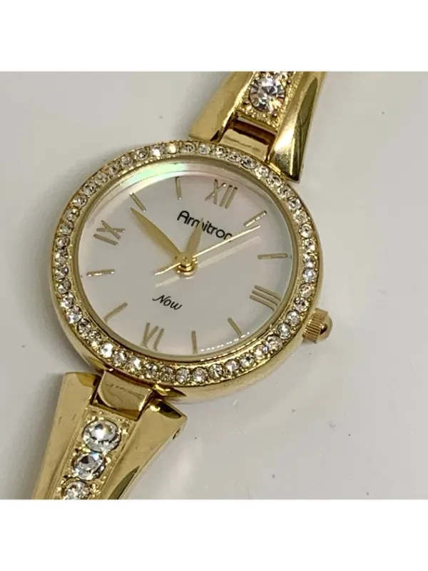Armitron women’s watch gold tone 24mm mop dial quartz rhinestones running - Image 4
