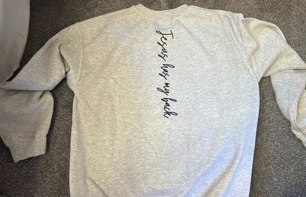 Heather grey “ Jesus has my back” crewneck - Image 2