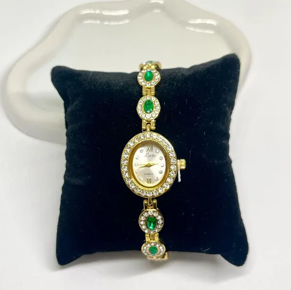 Luxury women’s watch sparkly emerald green stone - Image 2