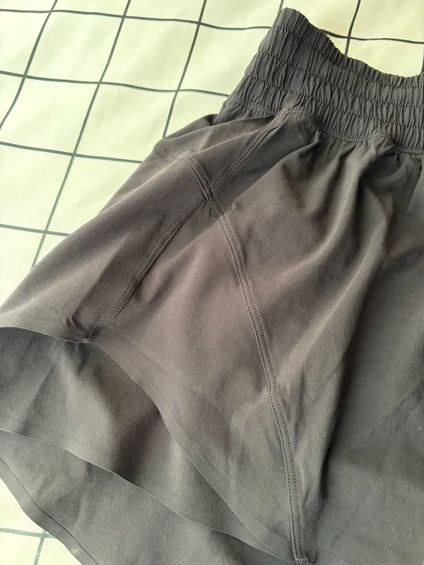 Woman’s Black Lululemon Shake It Out High-rise Shorts, Length 2.5”, Size XS NWT. - Image 4