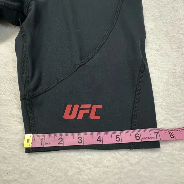 UFC Women's Black Bike Shorts with Red Logo and Side Pockets - Image 4