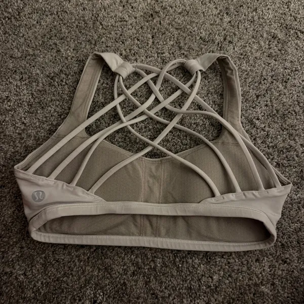 white lulu sports bra! barely worn, great condition! size 0! comes with pads! originally $48, selling for $25! ! - Image 2