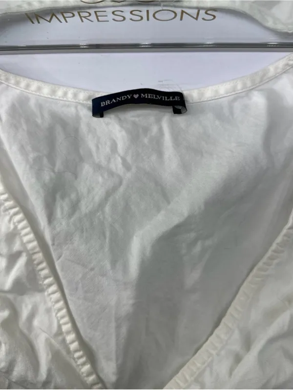 Brandy Melville White Sleeveless V-Neck Wrap Top (Ready To Ship) - Image 2
