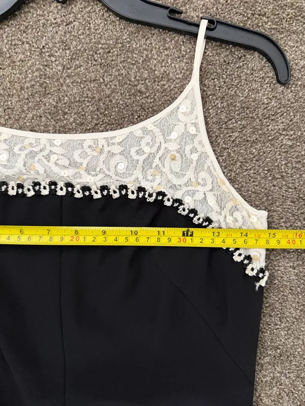 Elegant black maxi dress featuring a delicate cream lace yoke and thin straps. - Image 7