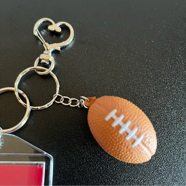 *30off3* Ravens Football 🏈 Keychain includes Heart Shape Silver‎ Medal Spring. - Image 2