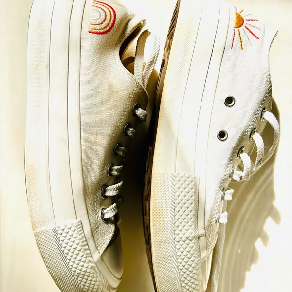 Ivory Converse sneakers with vibrant sun & rainbow side embroidery. - Image 5