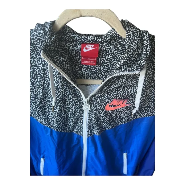 Nike Windrunner with a retro blue color-block design Nike Blue and Black - Image 2