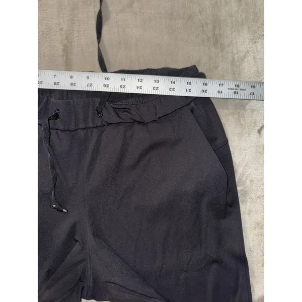 Lululemon Women's On The Fly Pants Black Mid Rise Travel Casual Size 8 - Image 7