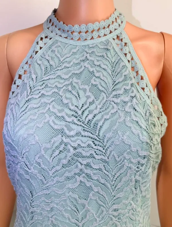 GUESS Sleeveless Mint Lace Halter Maxi Dress. Elegant mint lace halter maxi dress with delicate crochet trim. Soft mint color adds a fresh, feminine look. Halter neckline flatters the shoulders for a polished silhouette. Lightweight lace fabric offers breathable, comfortable wear. Ideal for weddings, garden parties, or special occasions. - Image 2