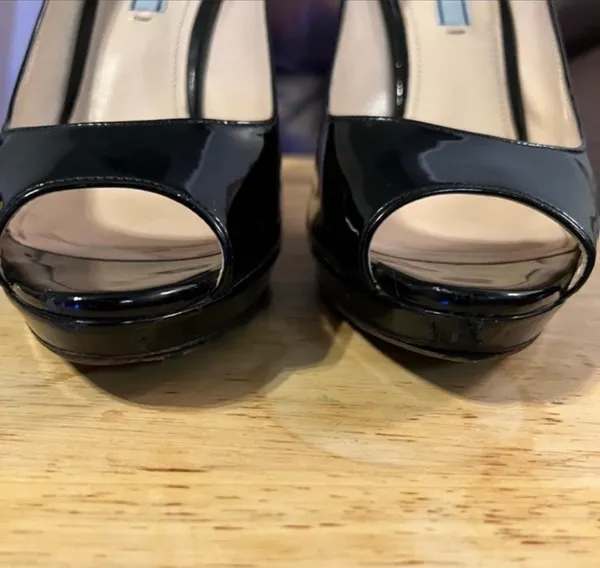 Prada peptoe Patent Leather Pumps are a size 8. - Image 7