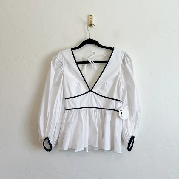 Staud | NWT Luna Contrast Peplum‎ V-Neck Open Back Top in White & Black - Image 2