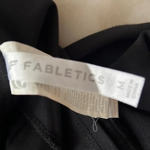Fabletics zip side spandex flare leg black pants size medium. - Image 3