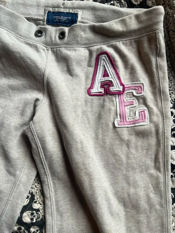 American Eagle Outfitters Light Gray Track Pants with Pink AE Patch - Image 2