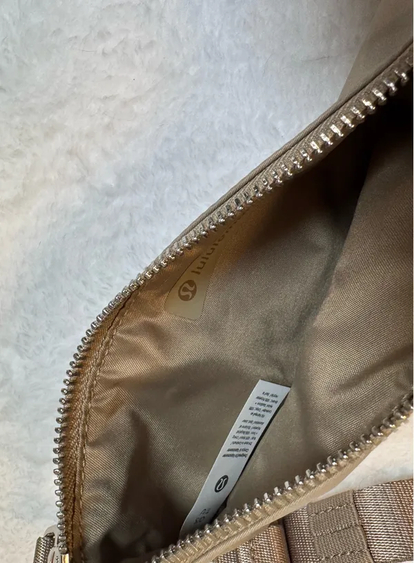 Dual pouch sling bag in beige by Lululemon - Image 9