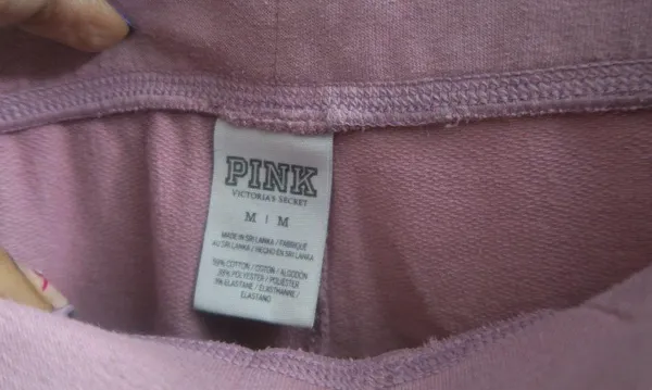 PINK Victoria's Secret shoelace front leggings pink nation on left leg drawstring in pink and white size medium. - Image 7