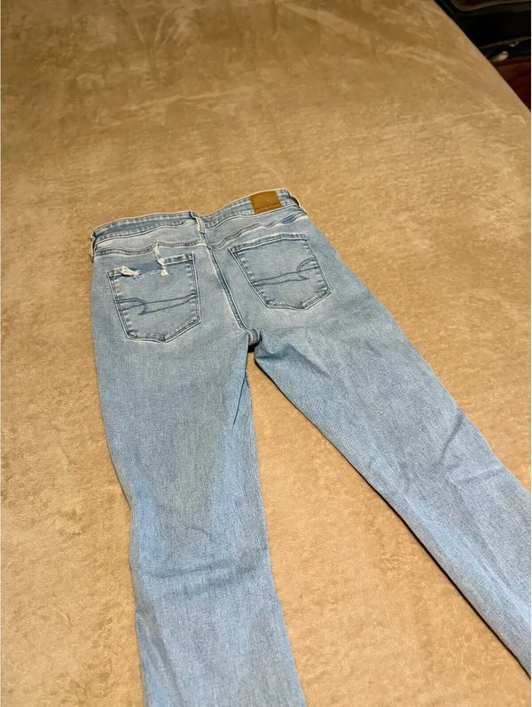American Eagle Next Level Stretch Light Wash Distressed Flare Jeans - Image 6