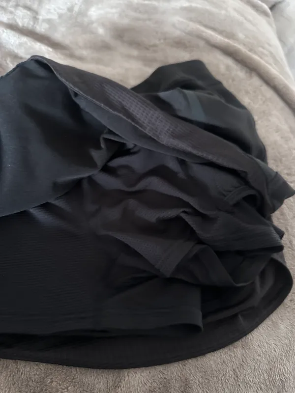 Athleta black tennis mini skirt with built in shorts. - Image 4