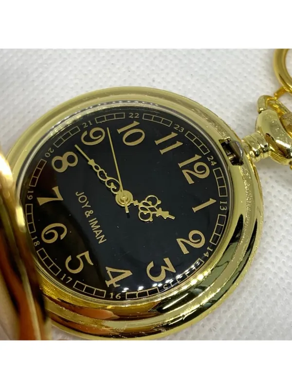 joy & iman Women’s gold tone pocket watch black dial Quartz analog 46mm running - Image 2