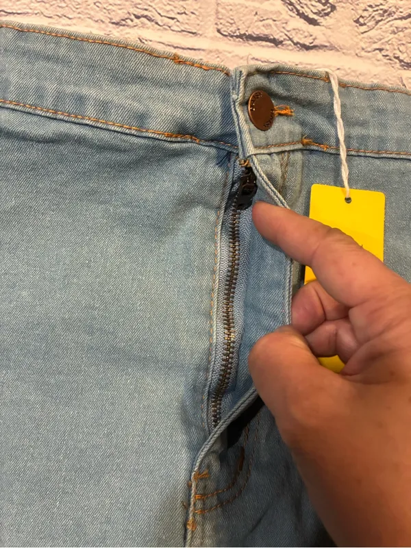 Daisy‎ Light Blue Denim Skirt with Yellow Brand Tag - Image 3
