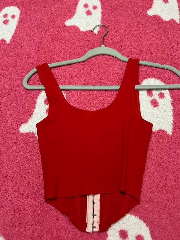 Mystique Boutique Stylish red sleeveless top with a front zipper. Perfect for casual outings. - Image 5