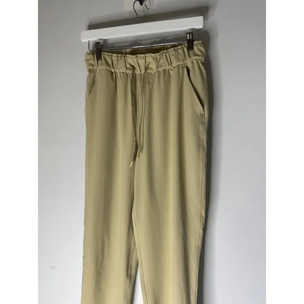 Lululemon On the Fly 7/8 Pant Luxtreme Khaki Tan Jogger Size 6 - Image 3