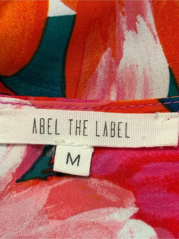 Abel the Label floral print dress with smocked waist and a high-low hem size M - Image 5