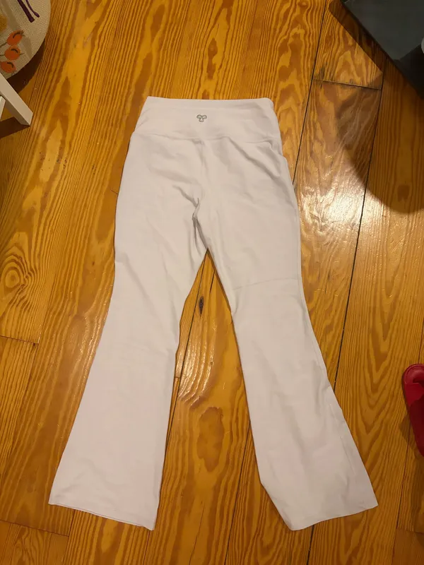 Aritzia TNA light pink flare leggings - Image 2