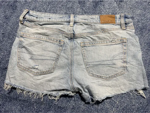 American Eagle Light Wash Distressed Denim Shorts with Frayed Hem - Image 5