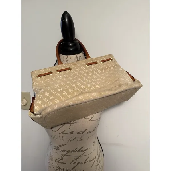 Dooney and Bourke Beige Canvas and Leather Signature Tassel Tote Handbag‎ - Image 2