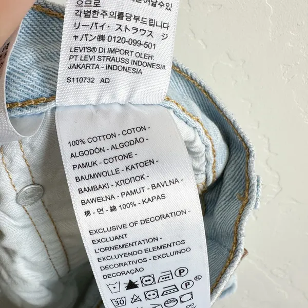 Levi's | 501 Original 100%‎ Cotton Cut Off Raw Hem Jean Shorts in Medium Blue - Image 6