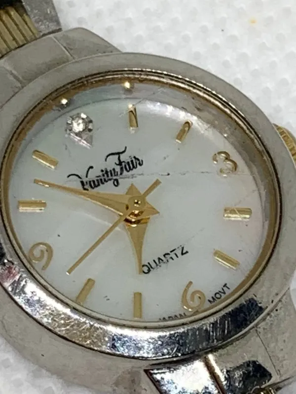 Vanity fair women’s watch silver gold tone 20mm mop dial quartz analog running - Image 2