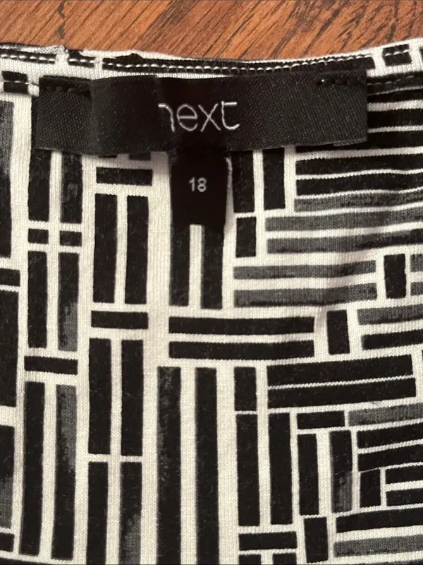 Black & White Geometric Wrap Dress - Women - Image 10