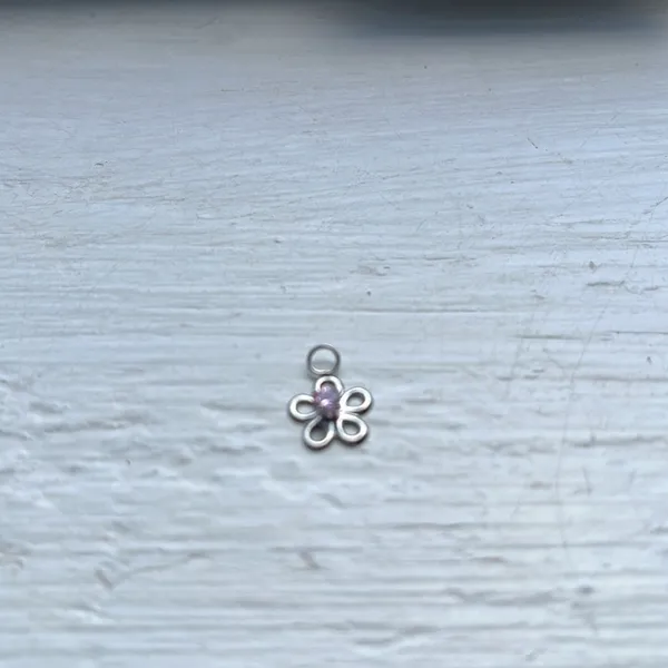 Silver with pink diamond in the middle of the flower necklace charm - Image 2