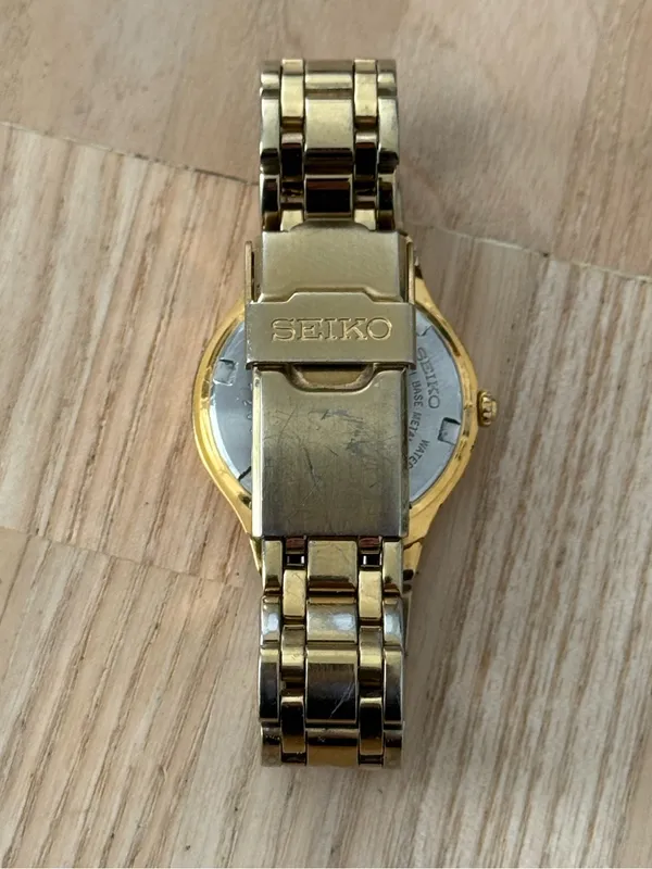 Seiko Vintage Watch Gold Bracelet Case White Dial Blue Gold Hands Date Window - Image 12