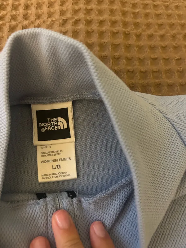 light blue north face woman’s quarter zip turtle neck vest in a size L - Image 3