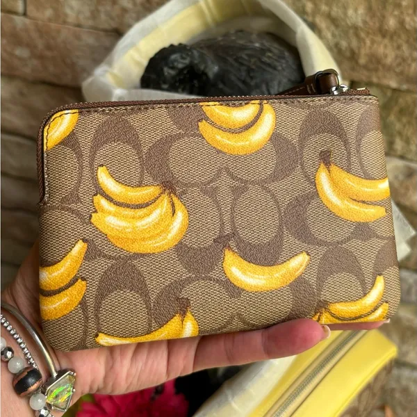 Authentic COACH Signature Coated leather BANANA zip top wristlet - Image 5