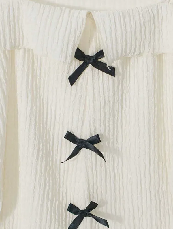 Women Tshirt soft cream square neckline with three black bow - Image 4