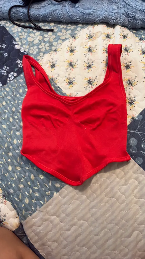 Out from under red tank top  - Image 2